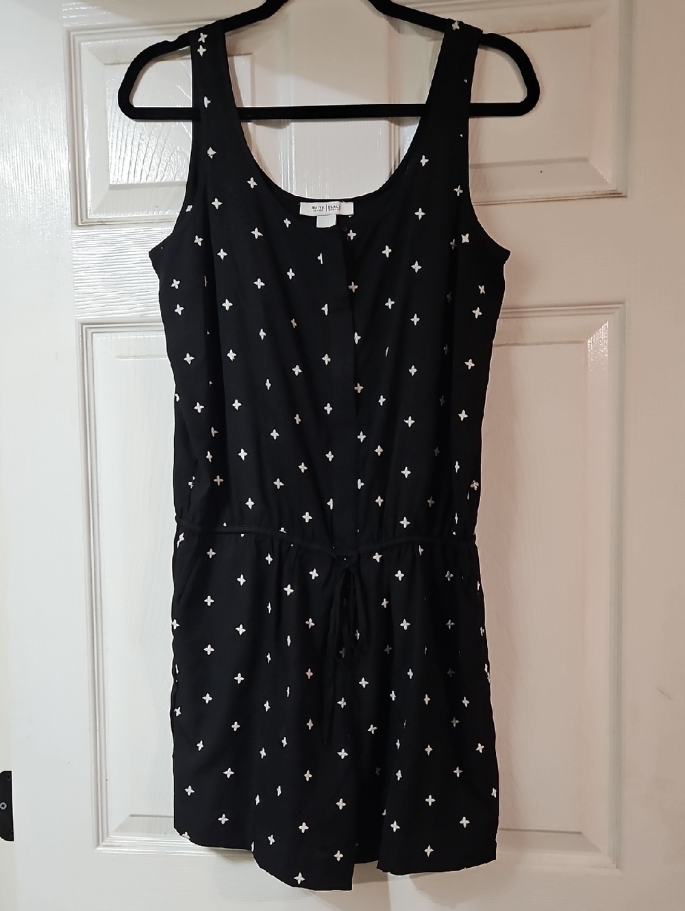 White House Black Market Black Sleeveless Romper with White Cross Print
